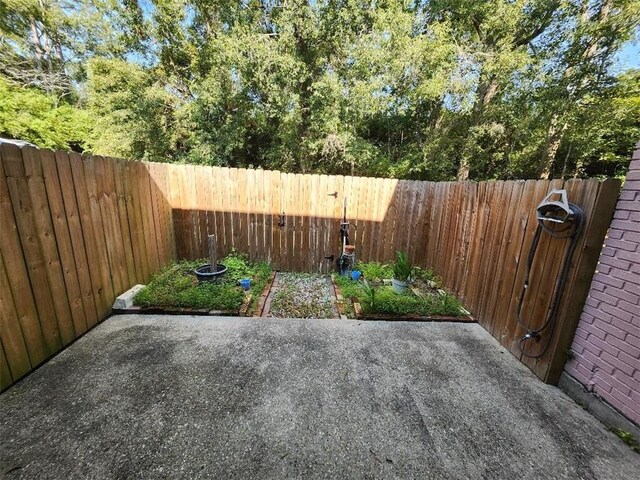 336 Indian Village Rd Unit 7, Slidell, LA 70461 - fenced backyard with a patio