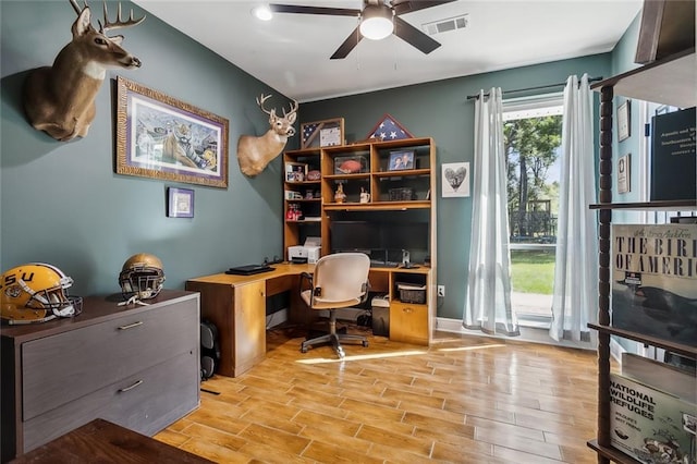 office area featuring light hardwood / wood-style flooring and ceiling fan