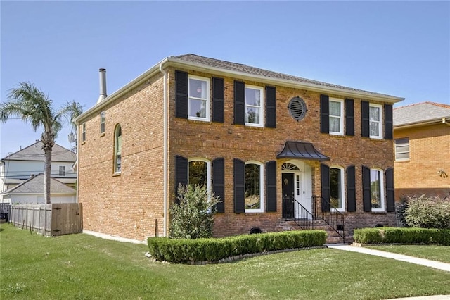 colonial house with a front lawn