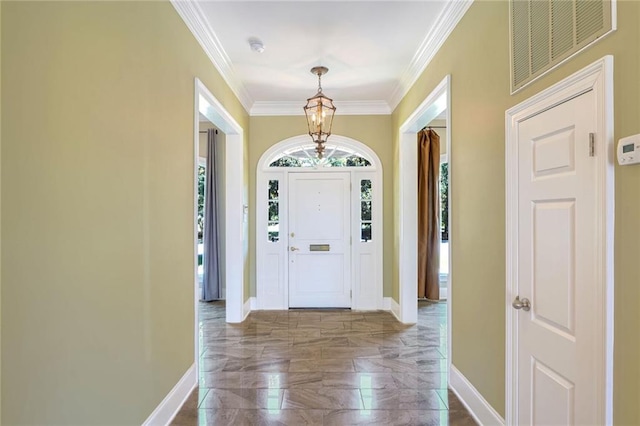 entryway with crown molding