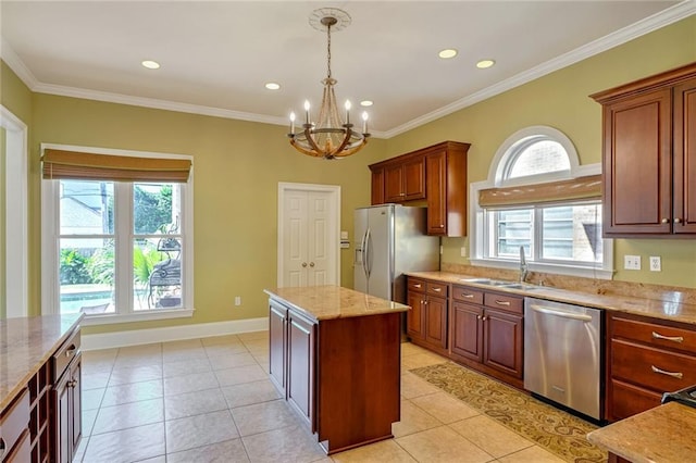 kitchen featuring appliances with stainless steel finishes, crown molding, a center island, and light tile patterned flooring