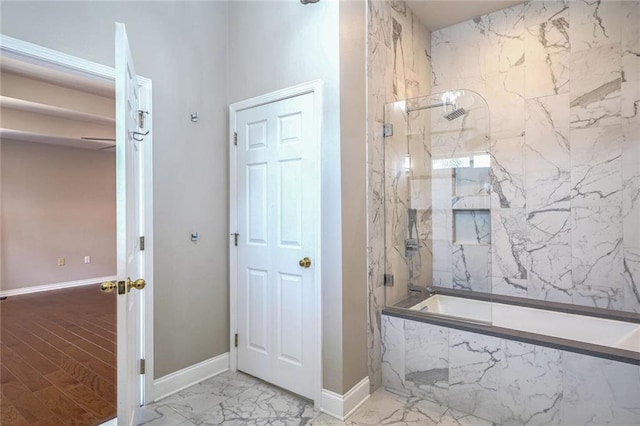 bathroom featuring tiled shower / bath combo