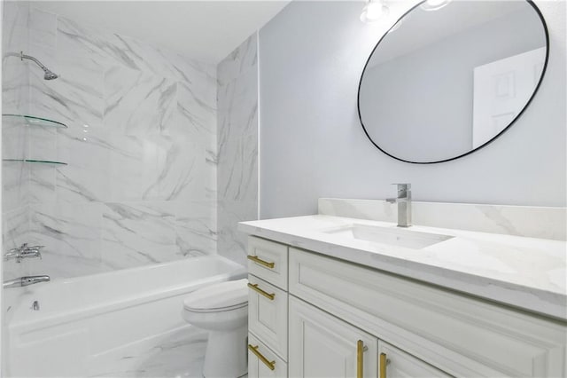 full bathroom featuring toilet, tiled shower / bath, and vanity