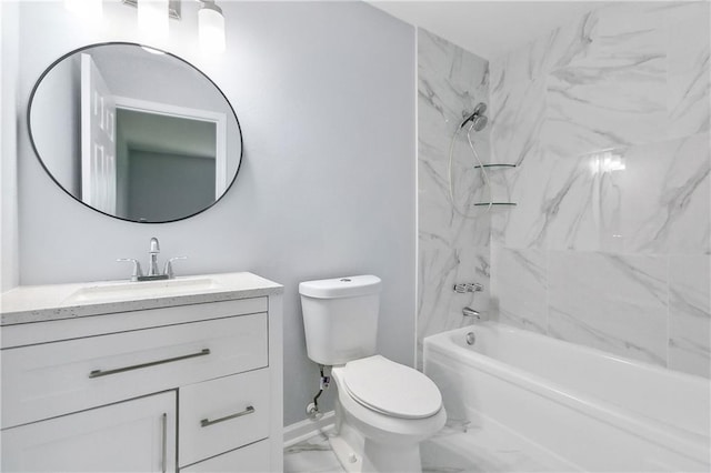 full bathroom with tiled shower / bath, vanity, and toilet