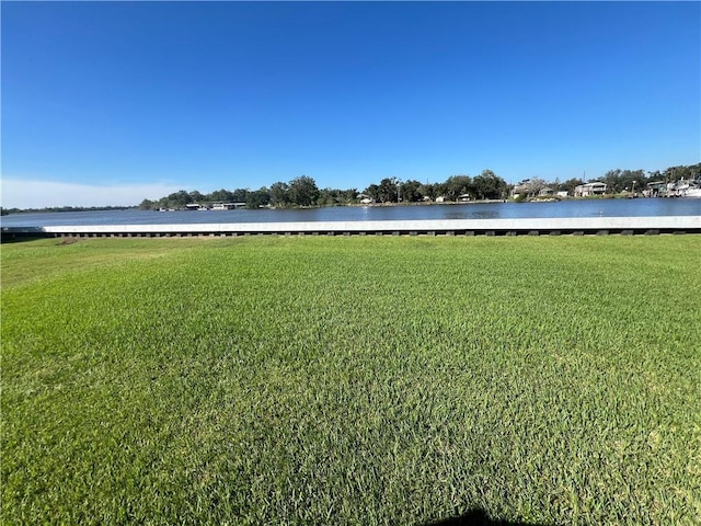 view of yard with a water view