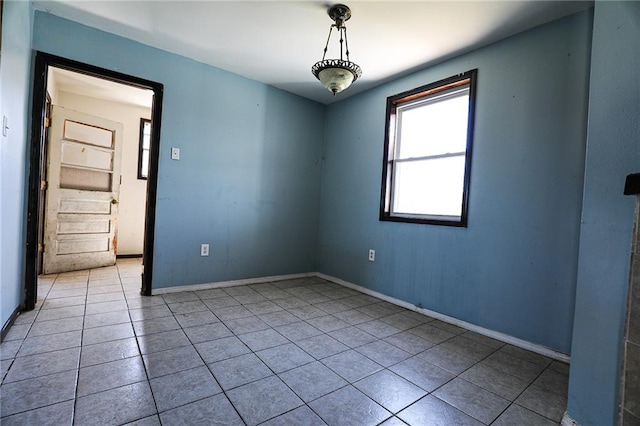 view of tiled spare room