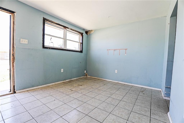 kitchen with ceiling fan and light tile patterned floors