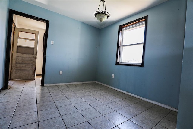 unfurnished bedroom with a closet, ceiling fan, and light tile patterned flooring