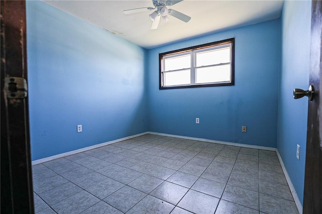 empty room featuring light tile patterned floors