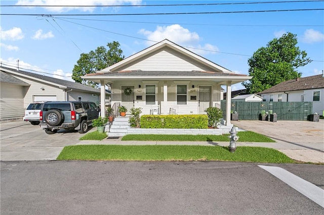 bungalow-style home featuring covered porch