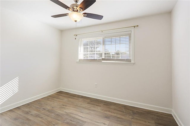 200-202 Pink St, Metairie, LA 70005 - empty room with baseboards, wood finished floors, and ceiling fan