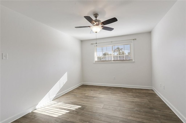 200-202 Pink St, Metairie, LA 70005 - empty room featuring wood finished floors, baseboards, and ceiling fan