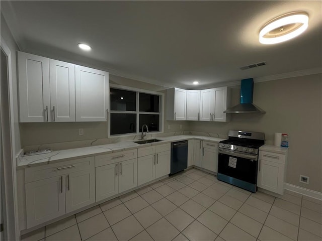 kitchen with white cabinetry, stainless steel gas range, dishwasher, and wall chimney range hood