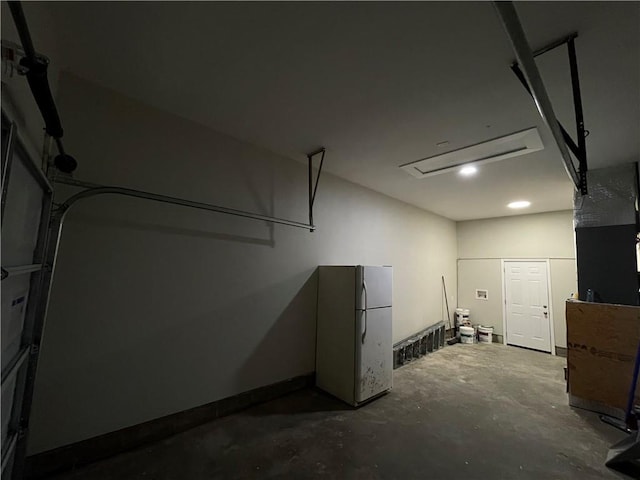 garage featuring white refrigerator