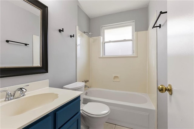 bathroom with toilet, tile patterned floors, bathing tub / shower combination, and vanity