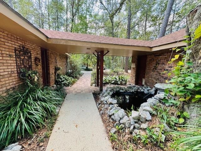 view of yard featuring a carport