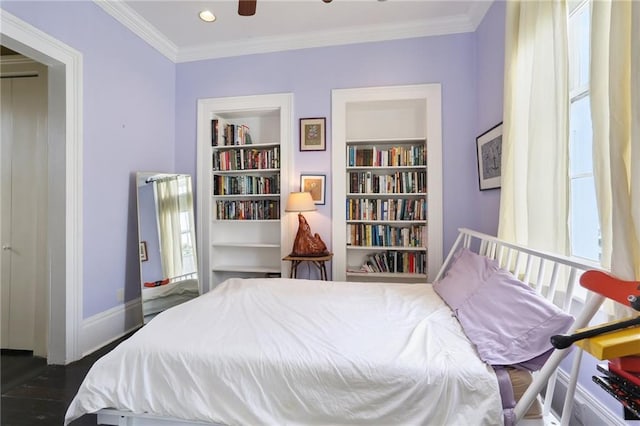 bedroom with crown molding and dark wood-type flooring