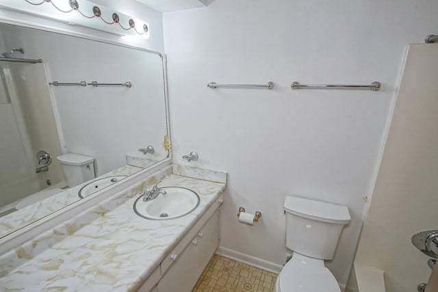 full bathroom featuring shower / bathing tub combination, vanity, and toilet