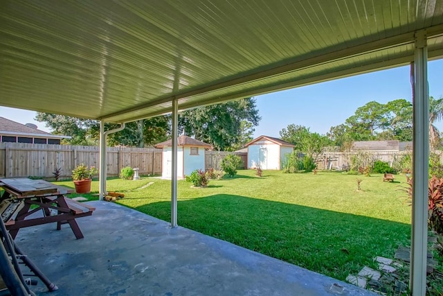 view of patio / terrace with a storage shed