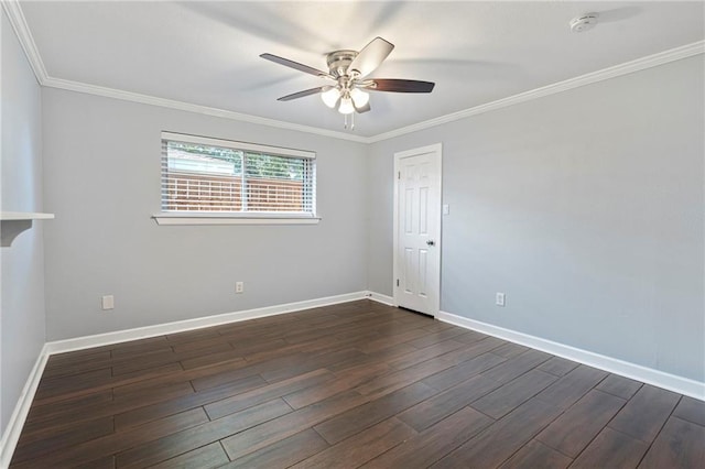 spare room with dark wood-type flooring, crown molding, and ceiling fan