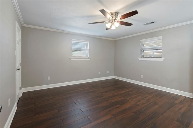 spare room with a healthy amount of sunlight, ceiling fan, and dark hardwood / wood-style floors