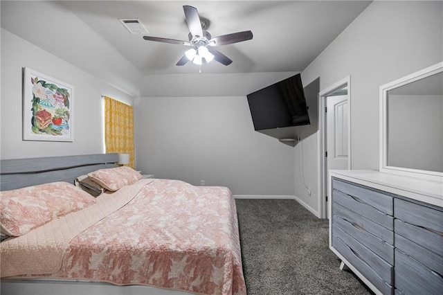 bedroom with ceiling fan and dark carpet