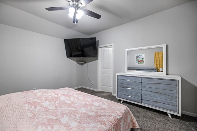 bedroom with ceiling fan and dark carpet