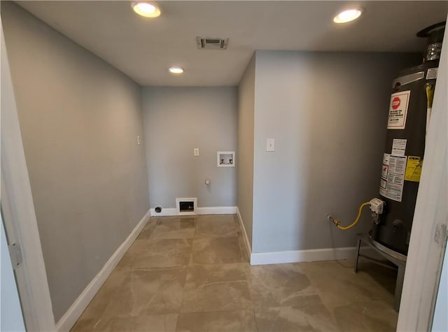 laundry room with washer hookup, gas water heater, and hookup for an electric dryer