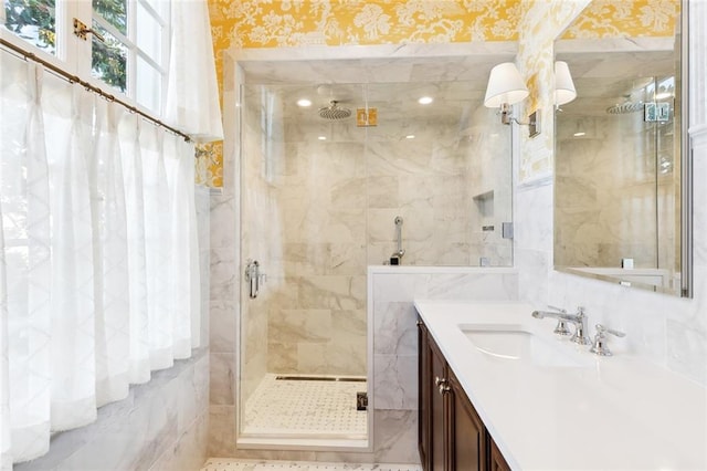 bathroom featuring vanity and walk in shower