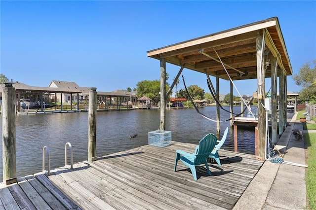 dock area featuring a water view