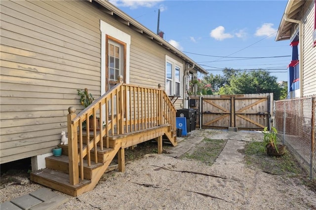 exterior space featuring a gate and fence