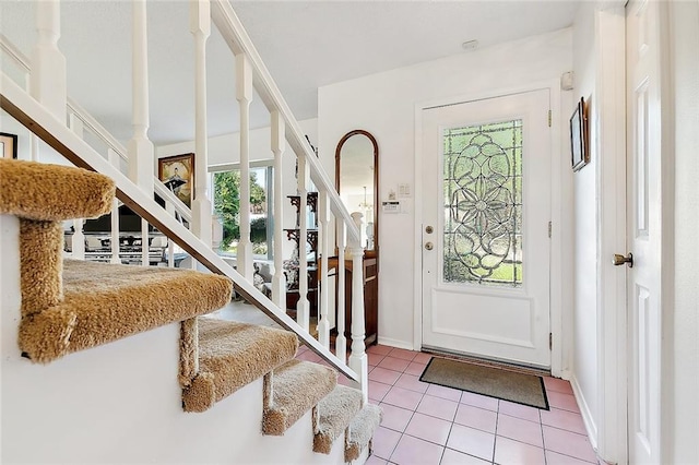 entrance foyer featuring light tile patterned floors