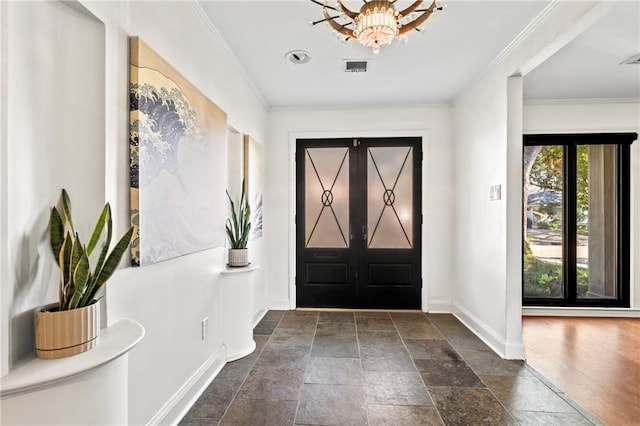 entrance foyer featuring crown molding