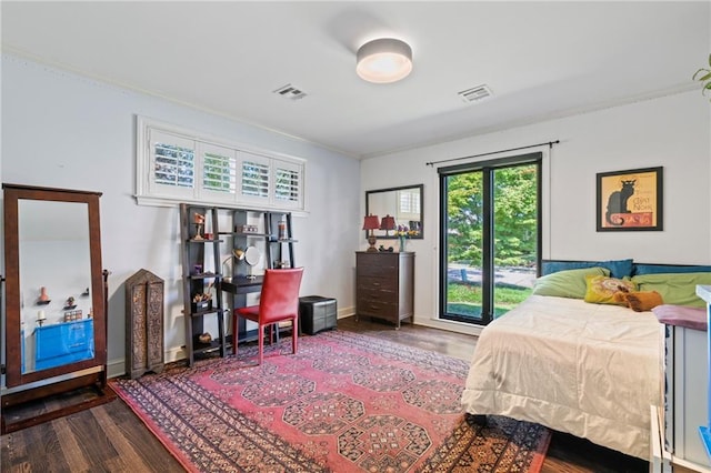 bedroom with access to outside, ornamental molding, and dark wood-type flooring