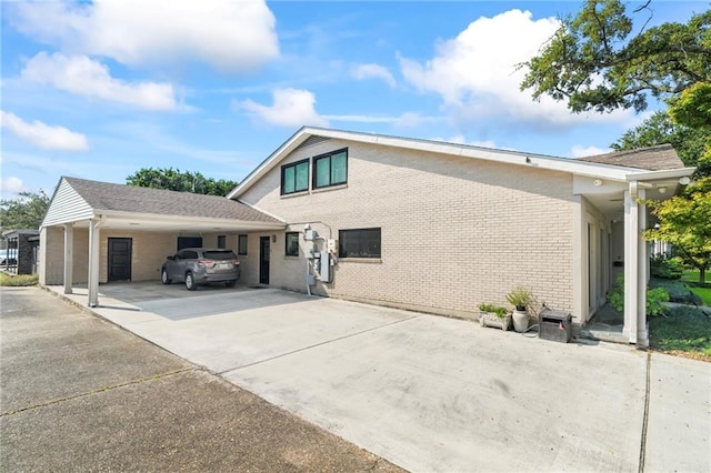 exterior space featuring a carport