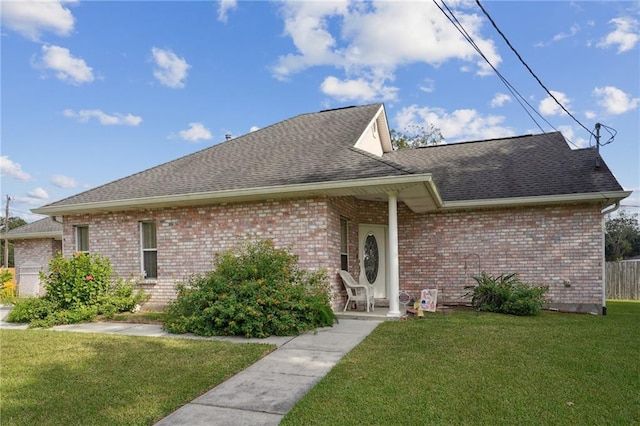 view of front of home with a front lawn