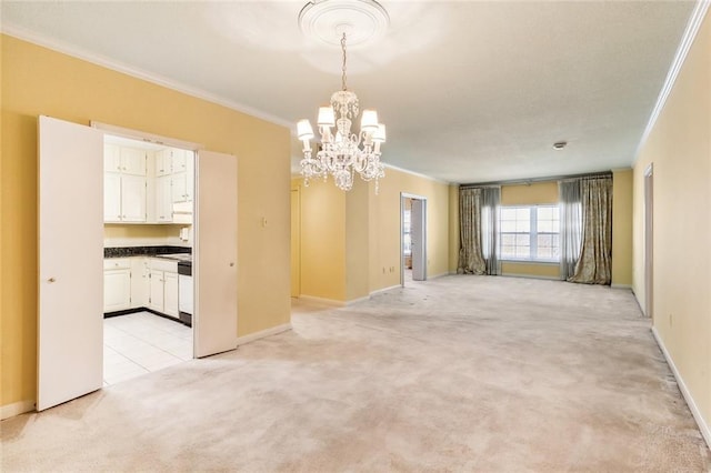 empty room featuring crown molding, baseboards, light colored carpet, and a notable chandelier