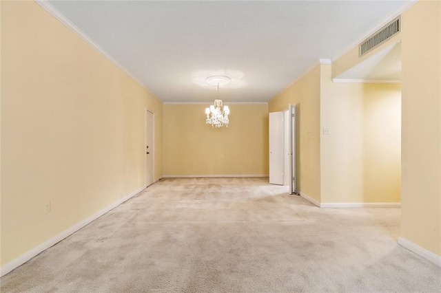 unfurnished room featuring light colored carpet, an inviting chandelier, and crown molding