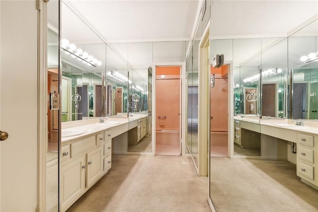 full bathroom with carpet floors, ornamental molding, and vanity