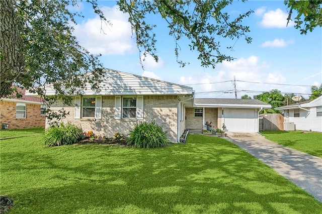 ranch-style house with a garage and a front yard