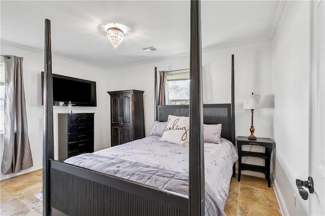 bedroom featuring crown molding