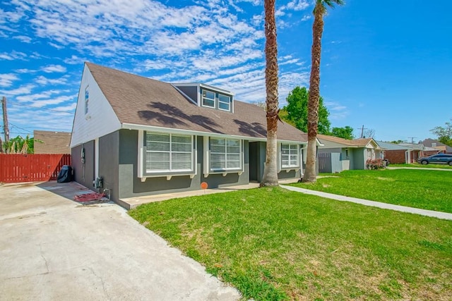 view of front of property with a front lawn