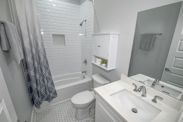 full bathroom with tile patterned flooring, vanity, shower / tub combo, and toilet