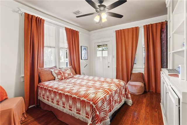 bedroom featuring dark wood-type flooring and ceiling fan