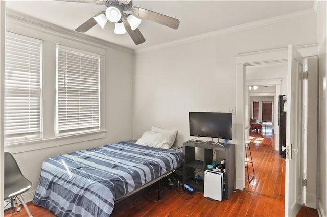 300709 Calhoun St, New Orleans, LA 70118 - bedroom with wood-type flooring, ornamental molding, and a ceiling fan