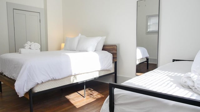 bedroom featuring hardwood / wood-style floors