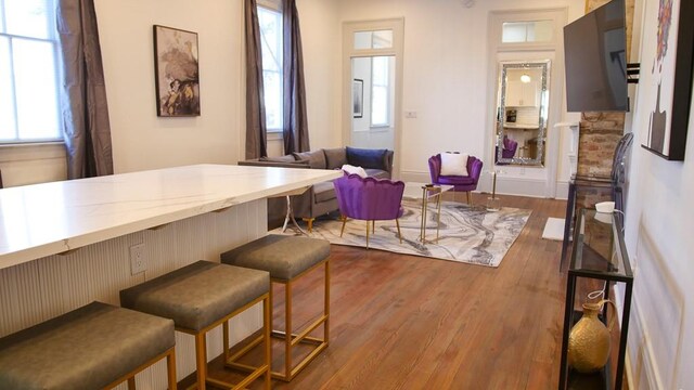 dining area featuring hardwood / wood-style flooring and plenty of natural light