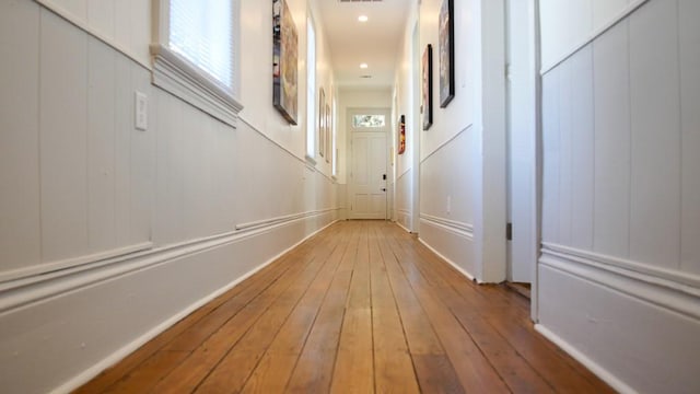 corridor with light wood-type flooring