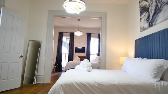 bedroom featuring dark wood-type flooring