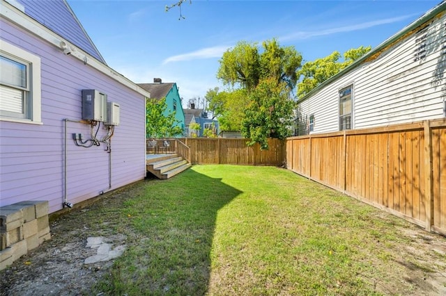 view of yard featuring a wooden deck